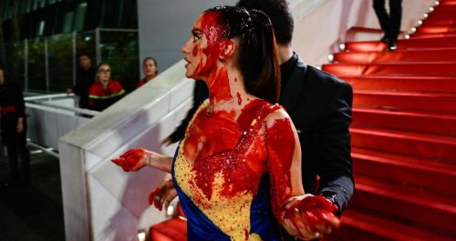 Woman bursts onto the red carpet in Cannes 