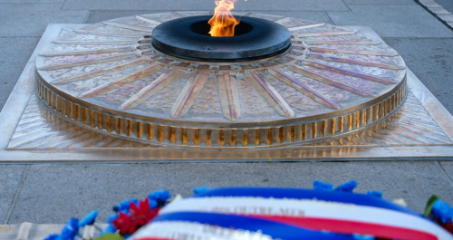 France’s Interior minister expresses his outrage after an individual lit a cigarette from the memorial flame in the French capital 